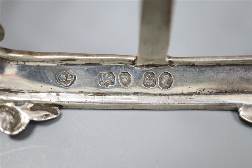 A Victorian silver six-division toast rack, George Angell & Co, London, 1853, length 16.3cm, 10oz.